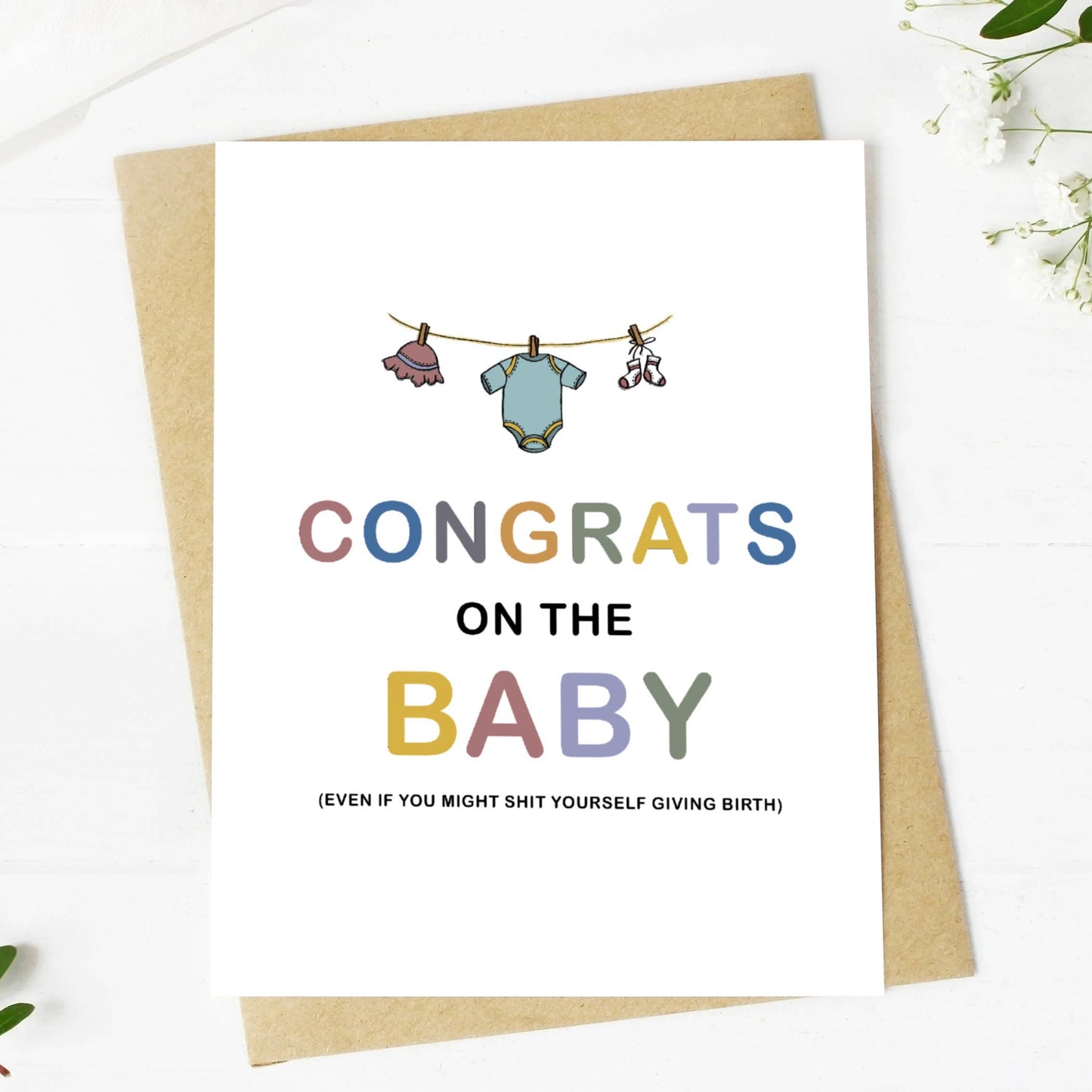 Congrats Baby clothes line greeting card front